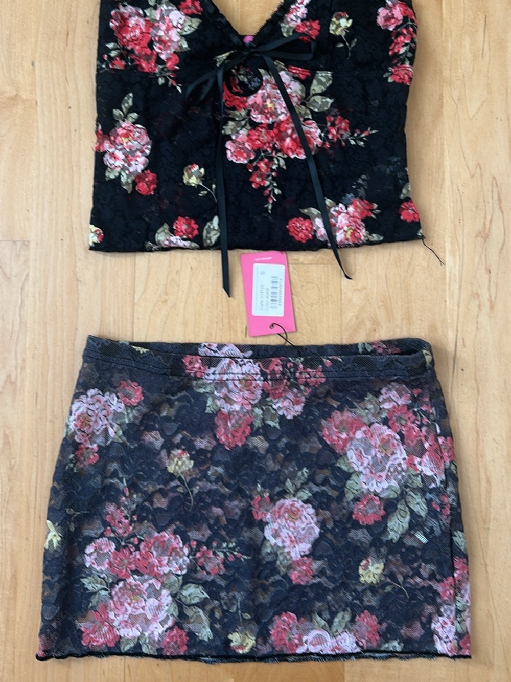 Edikted Black Lace Crop Top and Mini Skirt with Pink Floral Accents